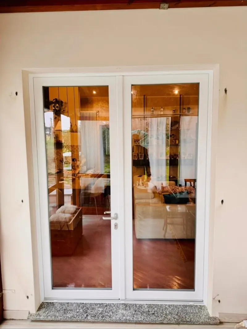 White two-leaf French door with clear glass