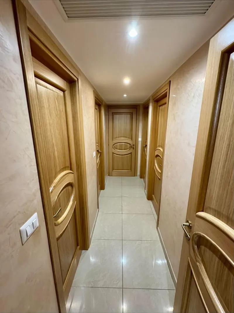 Corridor with wooden interior doors